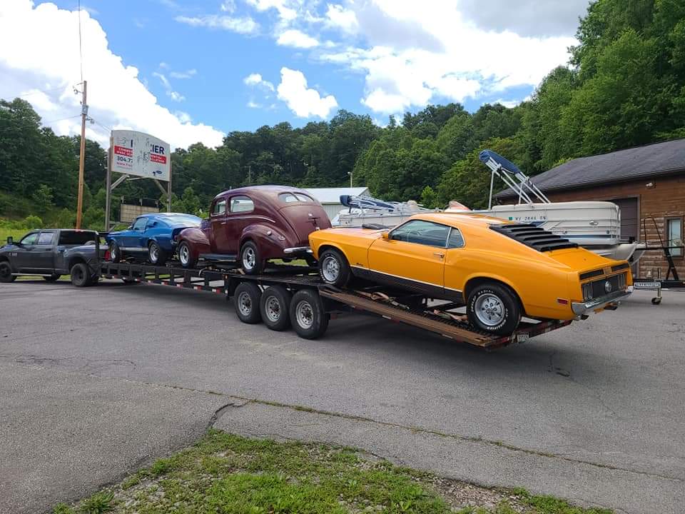 antique mustang on a trailer
